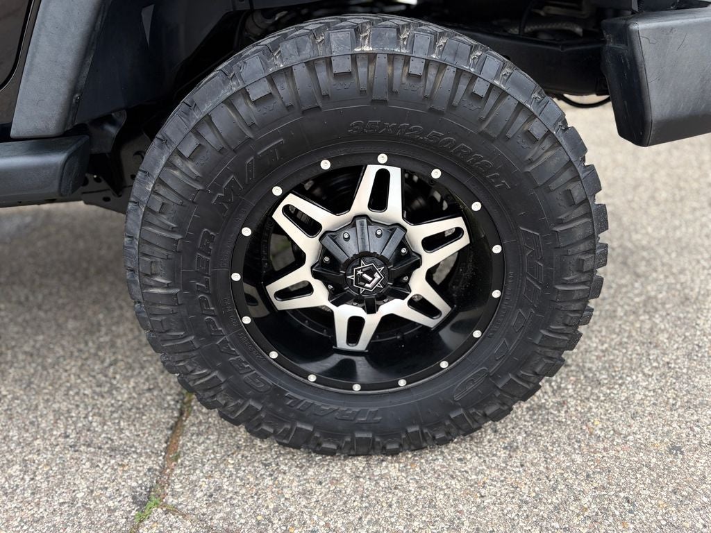 2014 Jeep Wrangler Unlimited Sport Black 3-Piece Hard Top