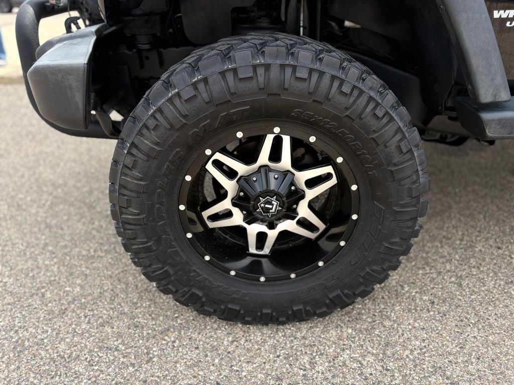 2014 Jeep Wrangler Unlimited Sport Black 3-Piece Hard Top